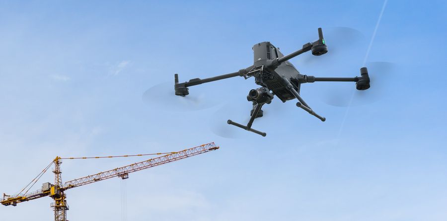 DJI Matrice 400 surveying a construction site